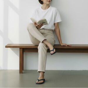 CROCS Black Sandals with Perforated Design and Pivoting Heel Strap